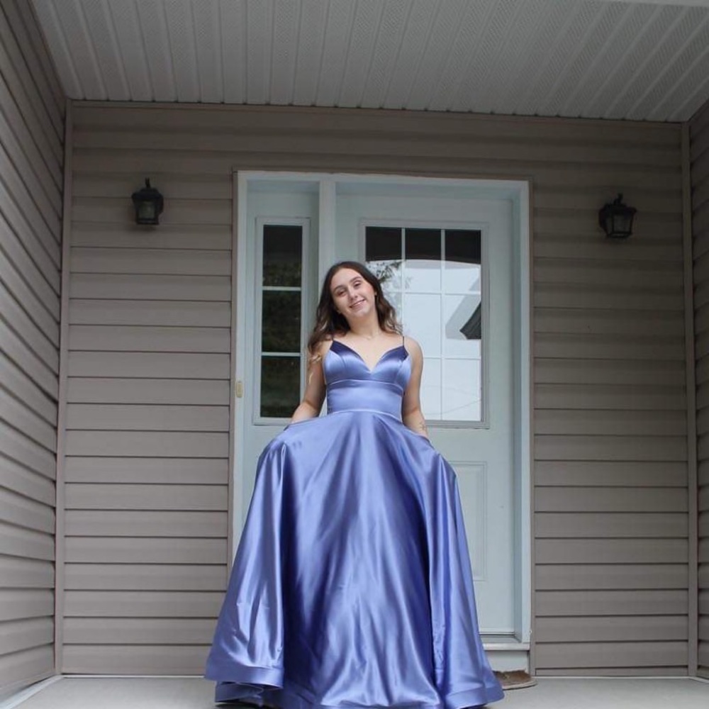 Jadore Evening prom dress. Size 6 and ink blue. Straps can be adjusted.